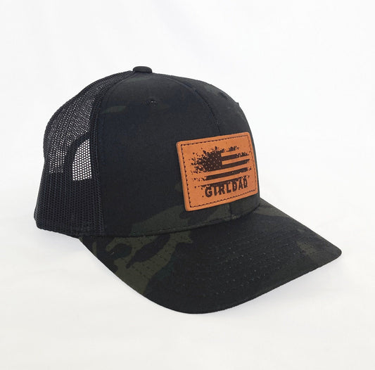 Girldad® Flag Teak Leather Patch on Black Camo Trucker Hat